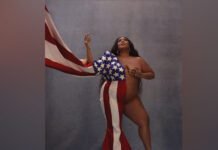 Singer lizzo poses naked with american flag